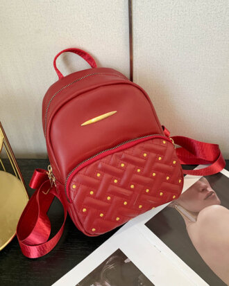 Rucsac Jules rosu din material textil cu model matlasat si barete reglabile, 23 x 17 x 8 cm